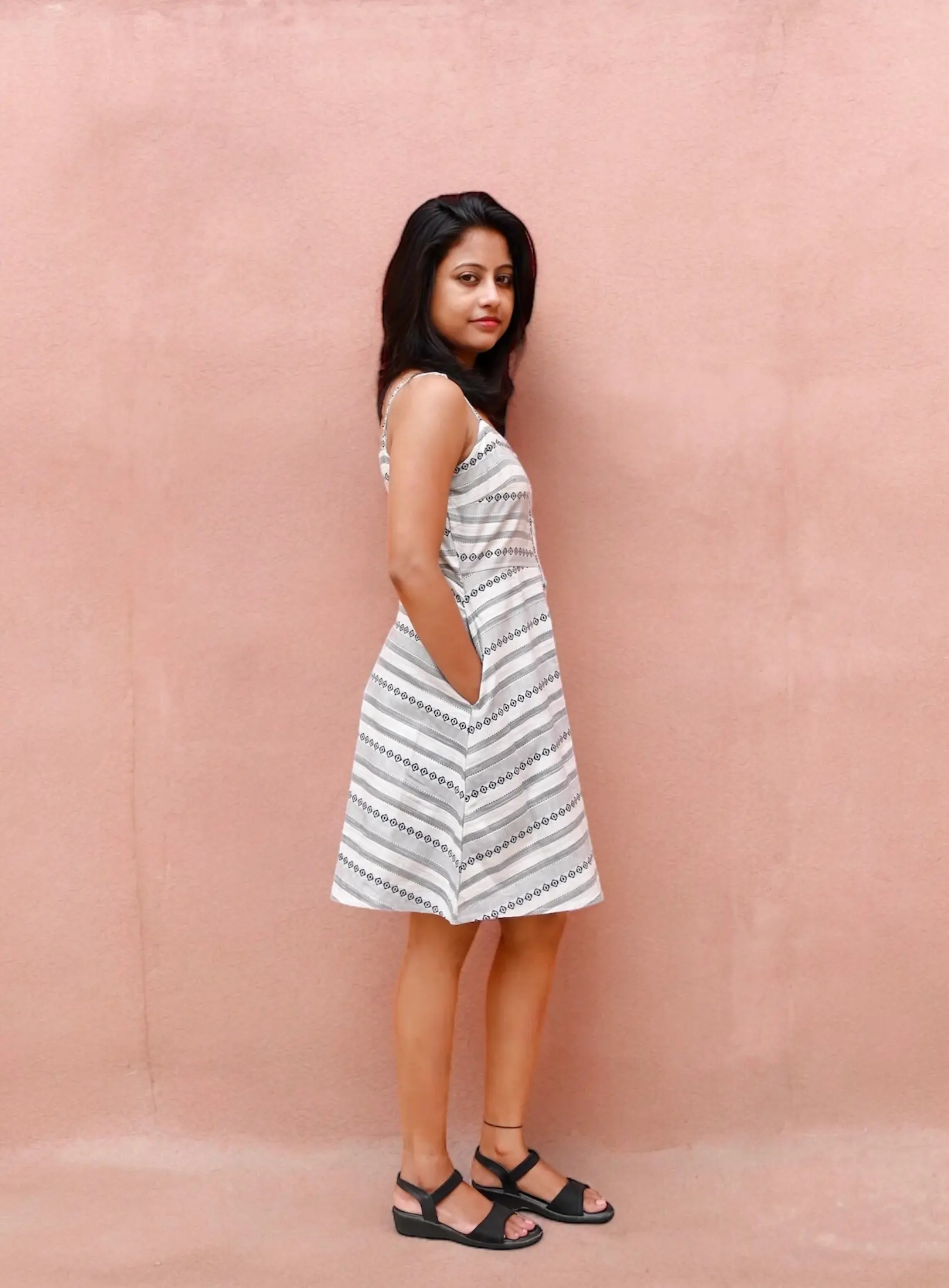 How to style a black and white striped dress for smart-casual looks - Bloomazz striped dress side view